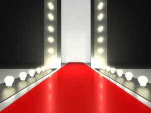 7565055-empty-red-carpet-fashion-runway-illuminated